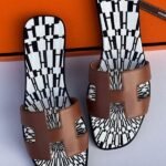 Hermès Printed Oran Flat Sandals Brown