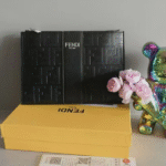 Fendi Black Embossed Logo Leather Wristlet Clutch Pouch Bag Black with Free Perfume