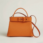 Hermès Médor Calfskin Leather Clous Togo Swift Crossbody Hand Bag Strap Orange with Free Perfume