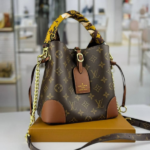 Louis Vuitton Monogram Leather Bucket Hand Shoulder Crossbody Chain Strap Bag Brown Tan with Free Perfume - Image 4