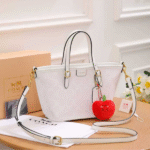 Coach Taxi Signature Canvas Leather Tote Hand Shoulder Bag Crossbody Strap Gold White with Free Perfume